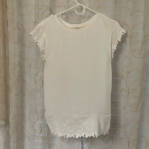 Loft knit top with cut out details.